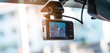 Car video camera attached to the windshield to record driving and prevent danger from driving